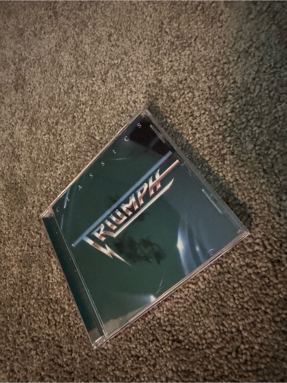 Triumph Green CD with Metallic Logo